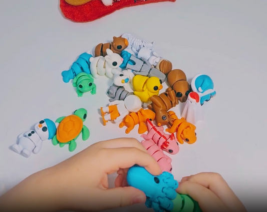 🎄 Jigglitz Advent Box — 24 fidget-stiilis värisevat mänguasja